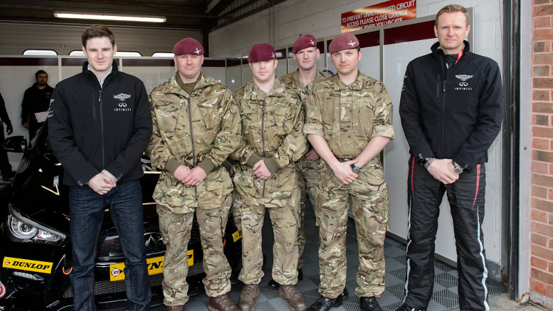 Paratroopers stand either side of Derek Palmer Jr (left) and Richard Hawken (right)